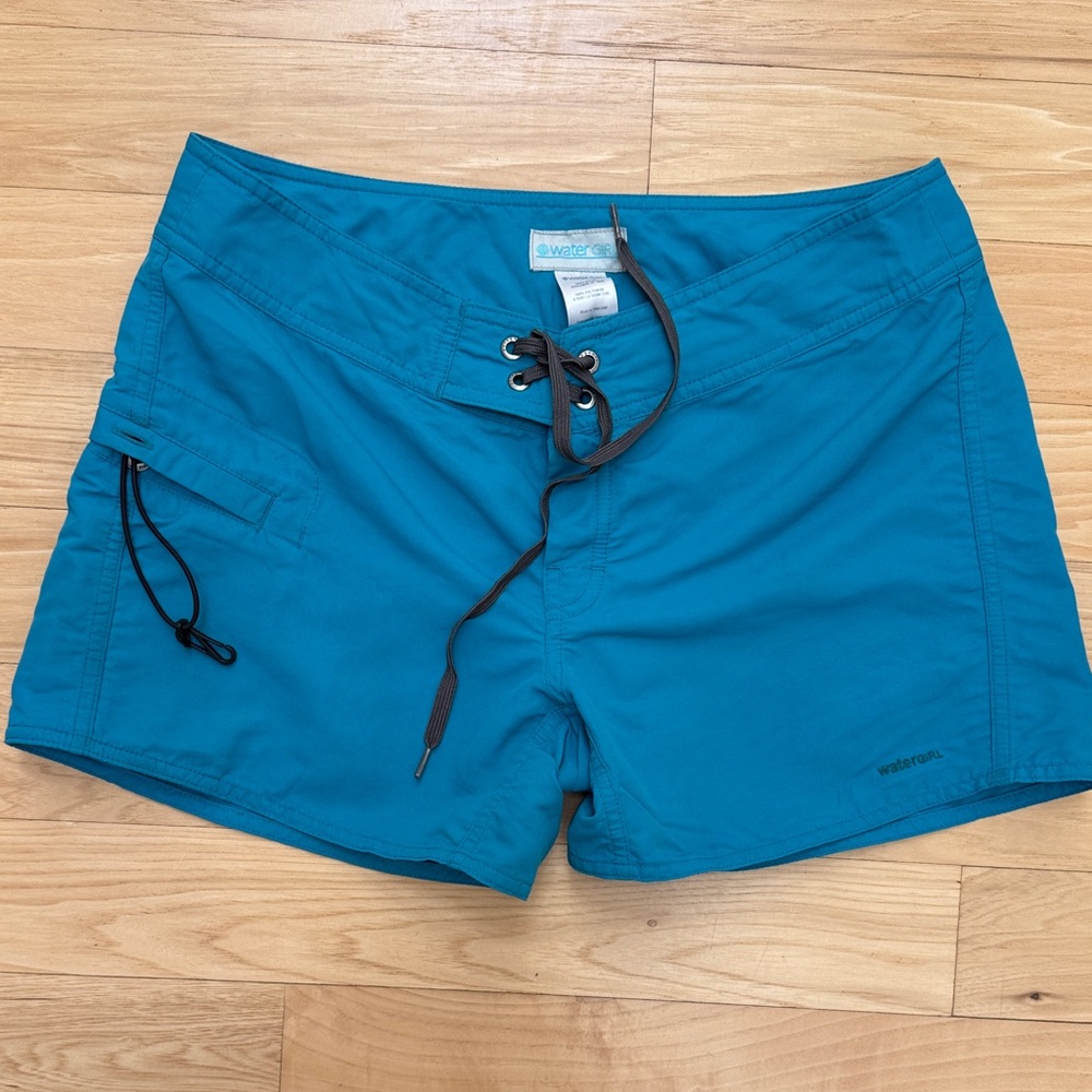 Teal Patagonia Watergirl
Board shorts with pocket and key clip sz 4